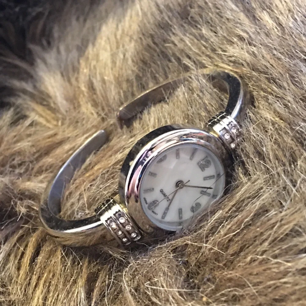 Ladies shiny silver rhinestone accent cuff watch